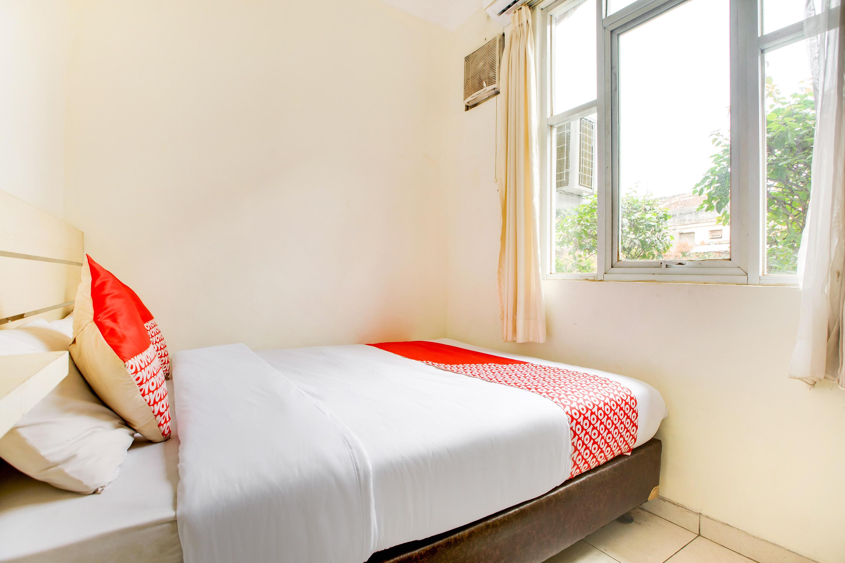 Reddoorz @ Arimbi Dewi Sartika Baru Hotel 3*