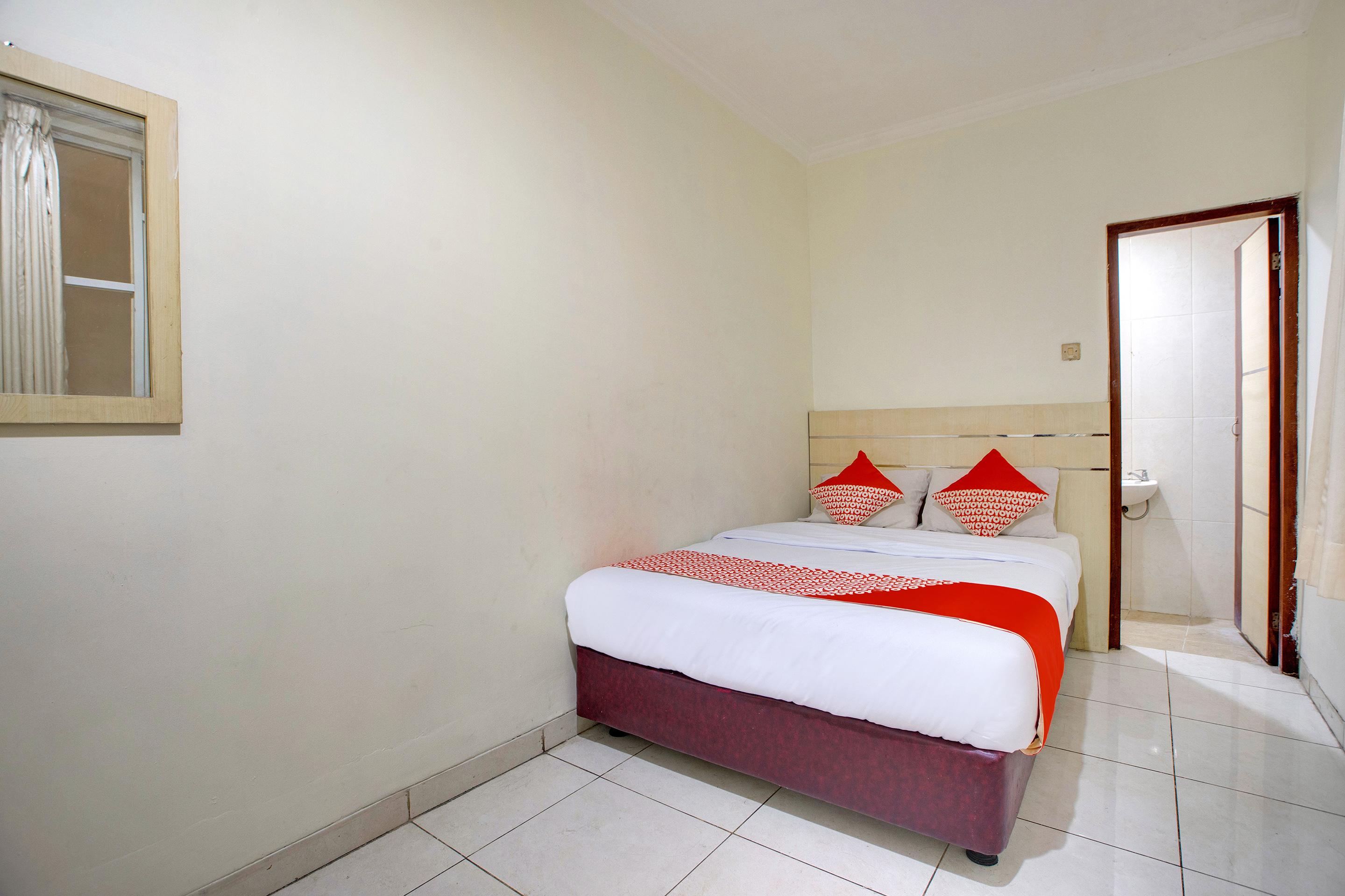 Reddoorz @ Arimbi Dewi Sartika Baru Hotel